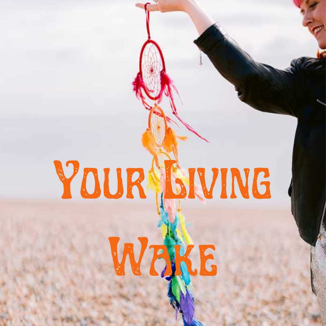 A Rainbow coloured dream catcher being held in the wind by the sea on the beach. It has the words Your Living Wake in orange letters